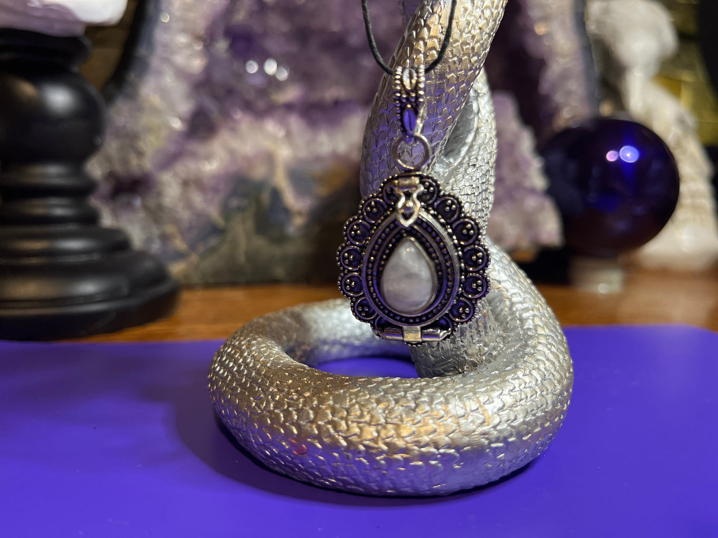 Marsha. Moonstone poison pendant.